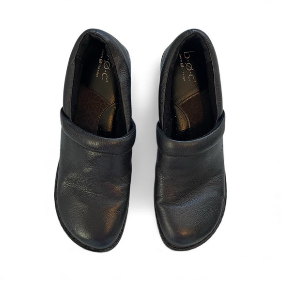 Black leather clogs with a slip-on design and a chunky heel by B.O.C. size 10